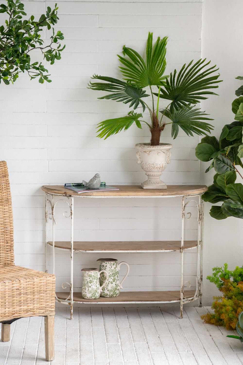 Three Tiered White Wooden Shelving Unit With Ornate Iron Frame - Multicolor